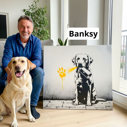 Man with a dog sitting next to a Banksy-style artwork of a dog with a yellow spray paint mark.